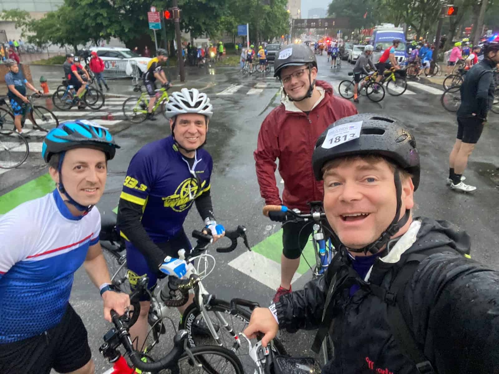 Tamman CEO Jeff Tamburino and Tamman President Marty Molloy pose with Jeff and James in Philadelphia before the Bike-a-thon took off. 